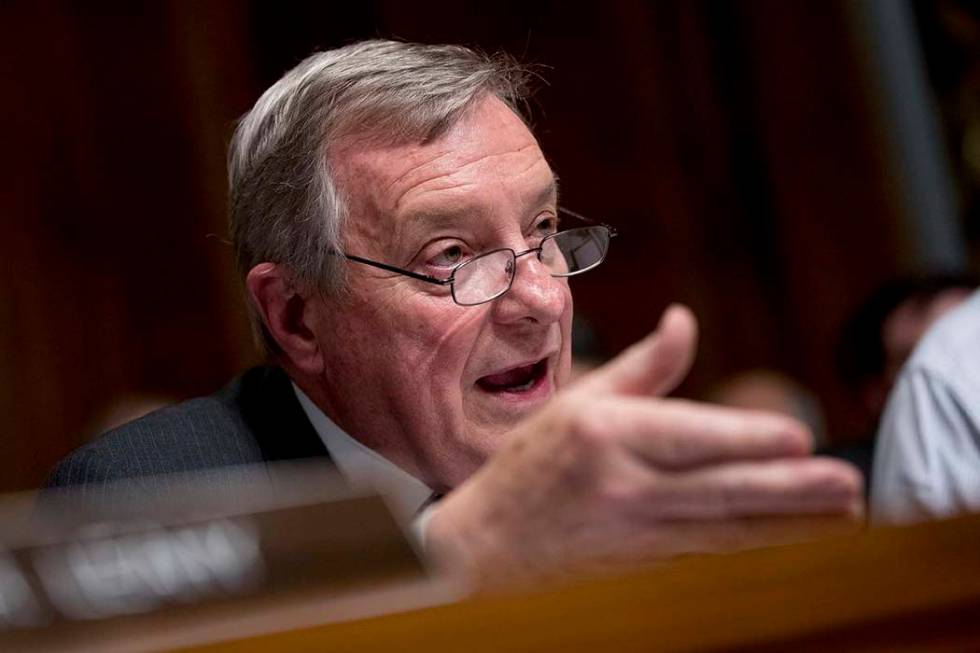 Sen. Richard Durbin, D-Ill., questions Attorney General William Barr as he testifies during a S ...