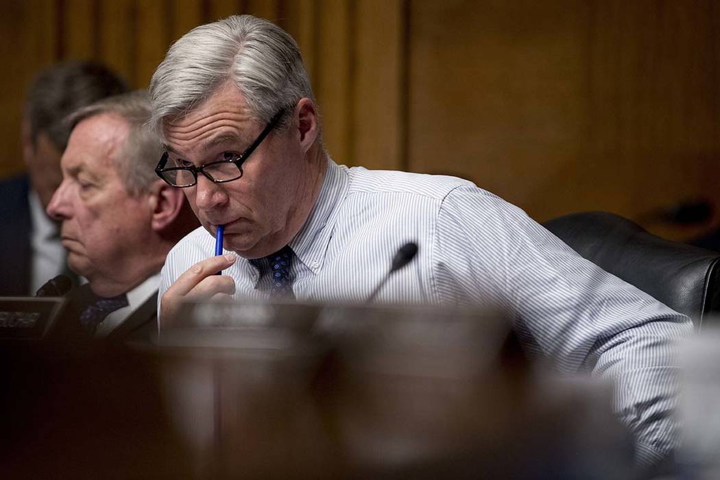 Sen. Richard Durbin, D-Ill., left, and Sen. Sheldon Whitehouse, D-R.I., right, listen as Attorn ...