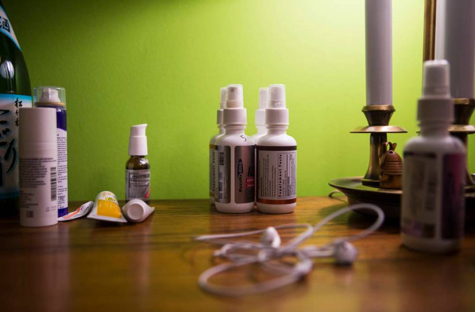 Medication on the bedside table of Grayson McClure at his home in Collierville, Tenn., on Thurs ...