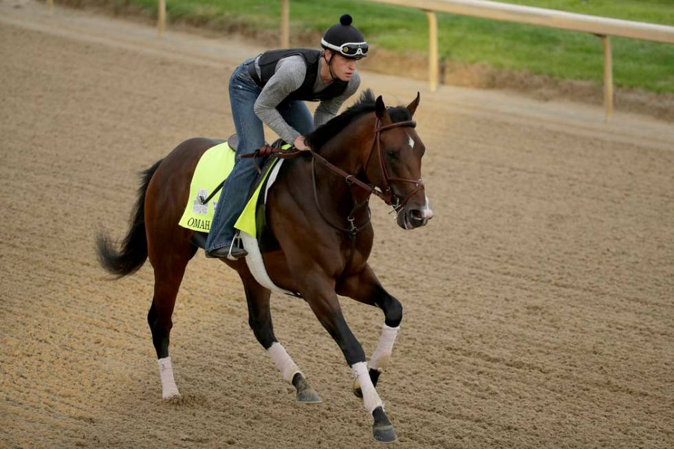 Exercise rider Taylor Cambra rides Kentucky Derby entrant Omaha Beach during a workout at Churc ...