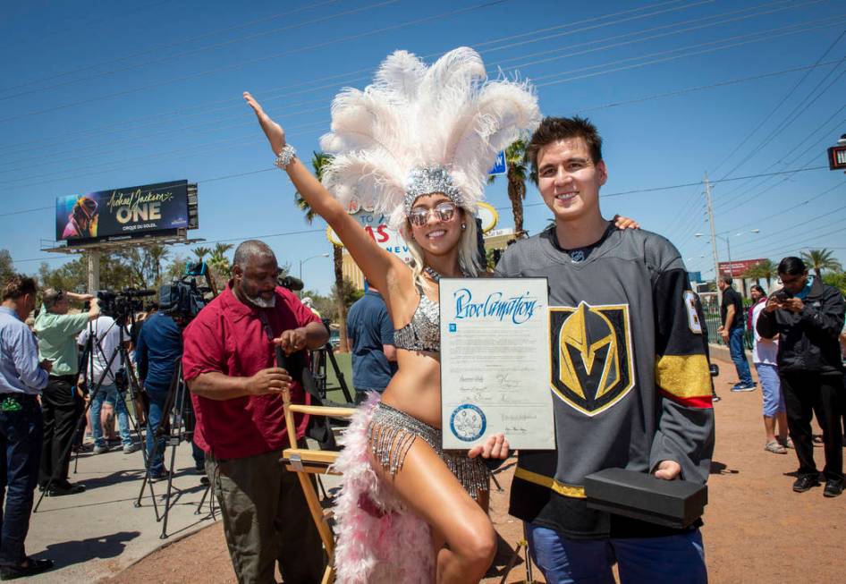 Heather Neckritz, left, poses for a photograph with "Jeopardy!" sensation James Holzh ...