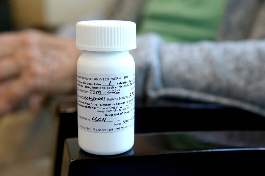 Anthony Brasich, 71, of Las Vegas shows his pill bottle with his patient ID, 001, while waiting ...