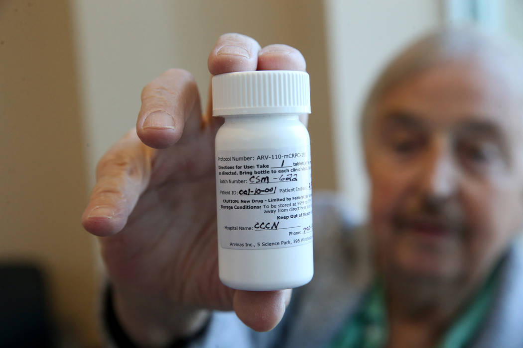 Anthony Brasich, 71, of Las Vegas shows his pill bottle with his patient ID, 001, while waiting ...