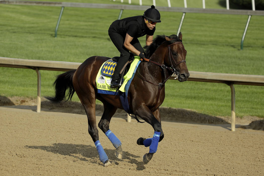 Kentucky Derby entrant Game Winner runs during a workout at Churchill Downs Thursday, May 2, 20 ...