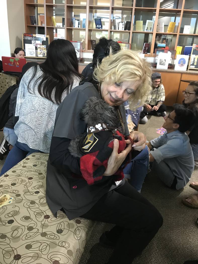 Dianne Woodward, a volunteer with Pet Partners of Las Vegas, with her dog, Teddy. Rachel Spacek ...