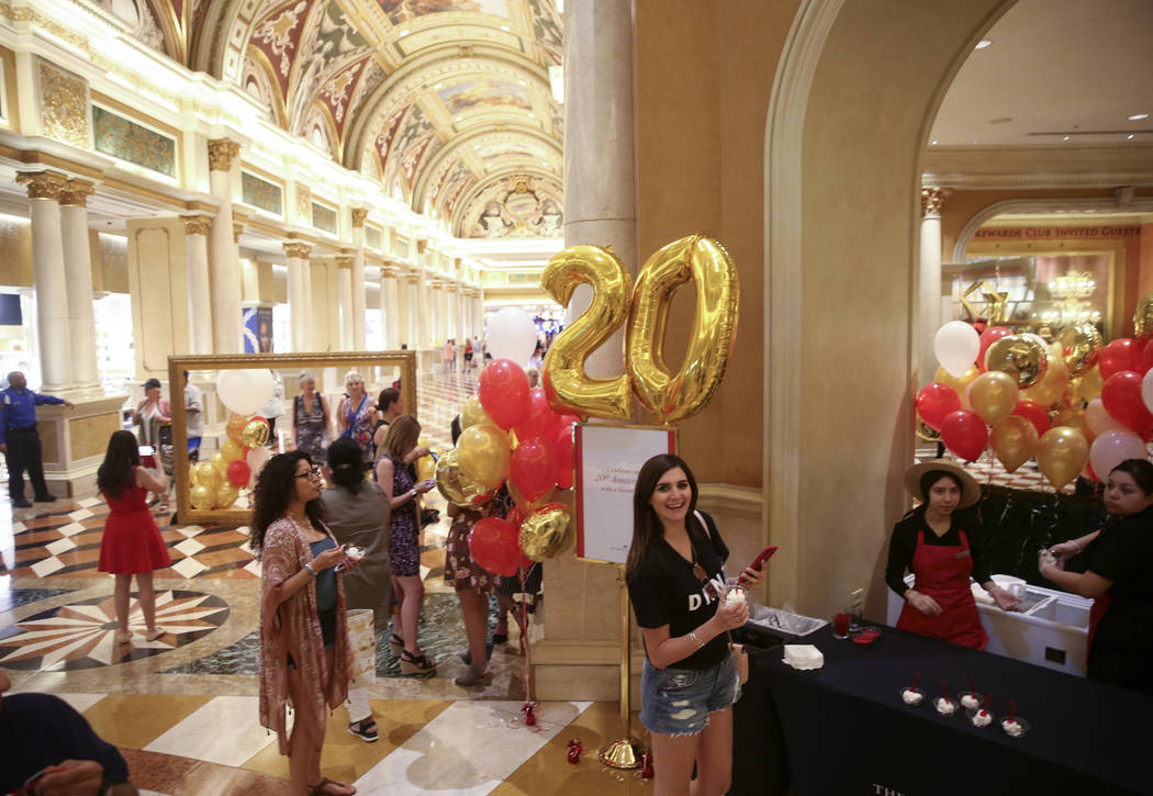Mabelle Azar of Lebanon grabs free gelato at The Venetian to celebrate the 20th anniversary of ...
