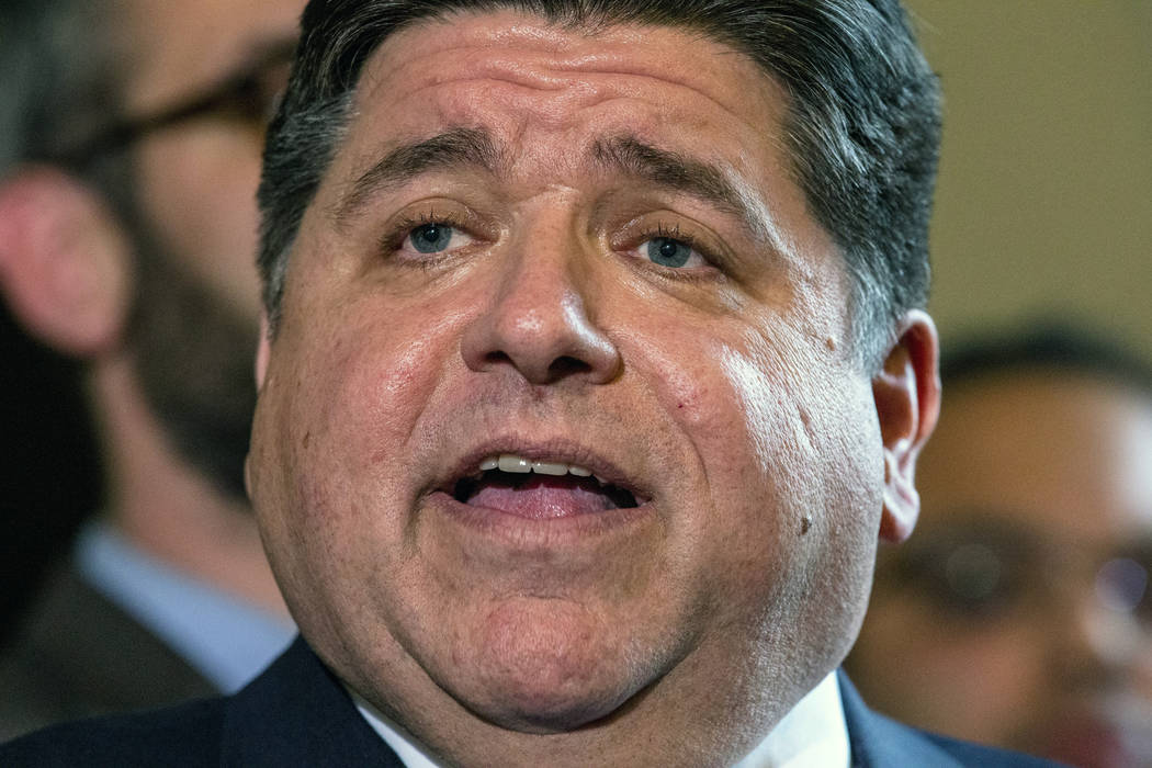 In this Feb. 7, 2019, file photo, Illinois Gov. JB Pritzker answers questions during a news con ...