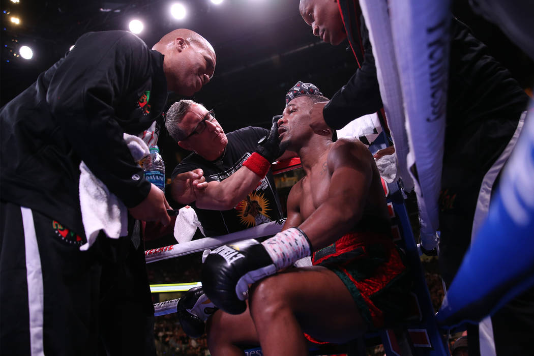 Daniel Jacobs sits in his corner before the 12th round against Saul Canelo Alvarez in the WBC, ...