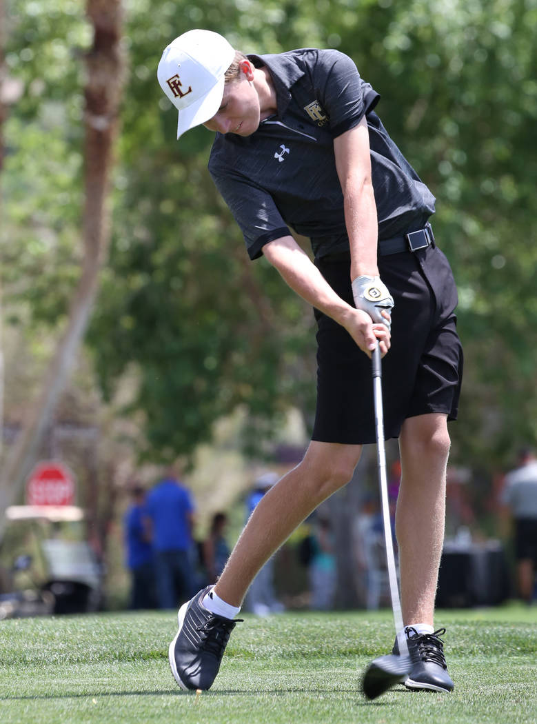 Faith Lutheran's Colton Cherry hits a drive during the Nevada State High School Regional Golf T ...