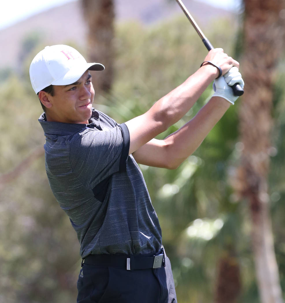 Faith Lutheran's Nick Desrochers watches his drive during the Nevada State High School Regional ...