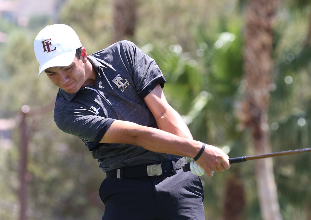 Faith Lutheran's Nick Desrochers drives his hit during the Nevada State High School Regional Go ...