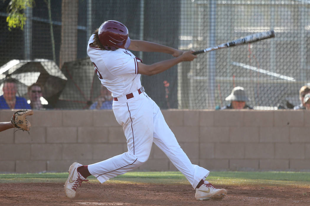 Desert Oasis' Campbell Holt (16) his a two run homer against Basic in the Desert Region champio ...