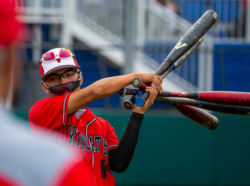 Las Vegas' Oliver Reyes (6) warms up to bat versus Reno during their state baseball tournament ...