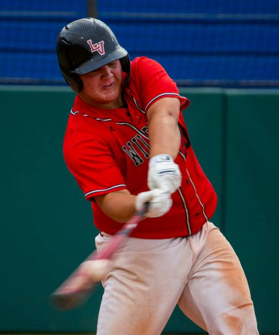 Las Vegas' Trevor Johnson (20) connects on a hit versus Reno during their state baseball tourna ...