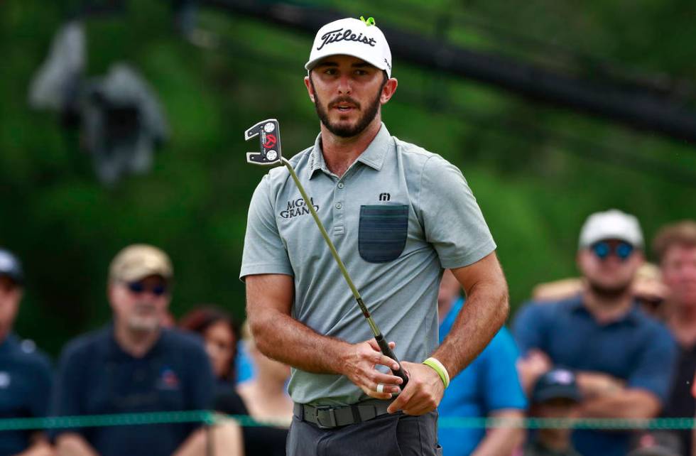 Max Homa watches his putt on the ninth hole during the final round of the Wells Fargo Champions ...