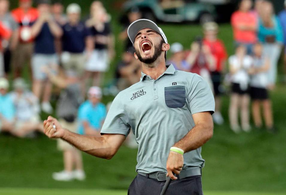 Max Homa celebrates after winning the Wells Fargo Championship golf tournament at Quail Hollow ...