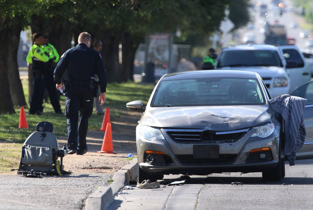 Henderson police investigate after a man in a motorized wheelchair was hit by a vehicle at Boul ...