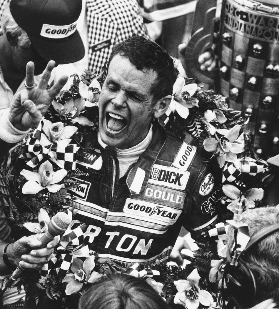 FILE - In this May 24, 1981 file photo, Bobby Unser celebrates after winning the 65th running o ...