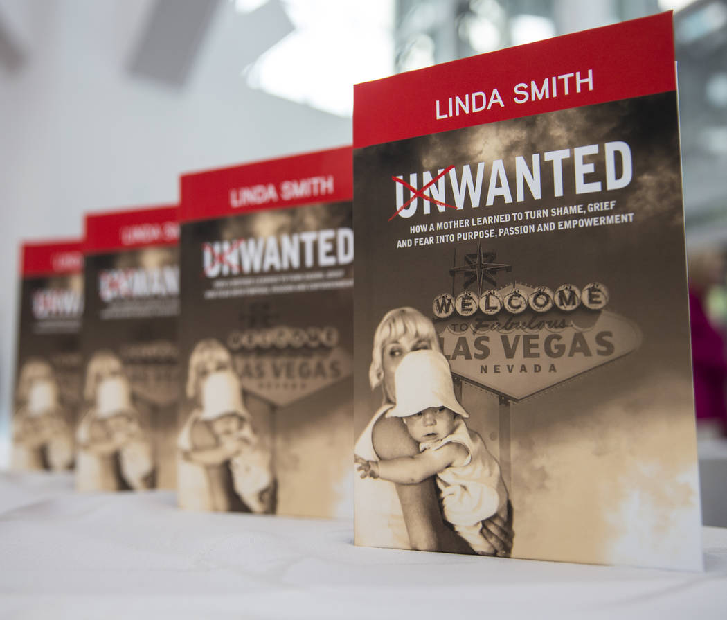 Copies of Linda Smith's memoir "Unwanted," about being a child abuse survivor and mot ...