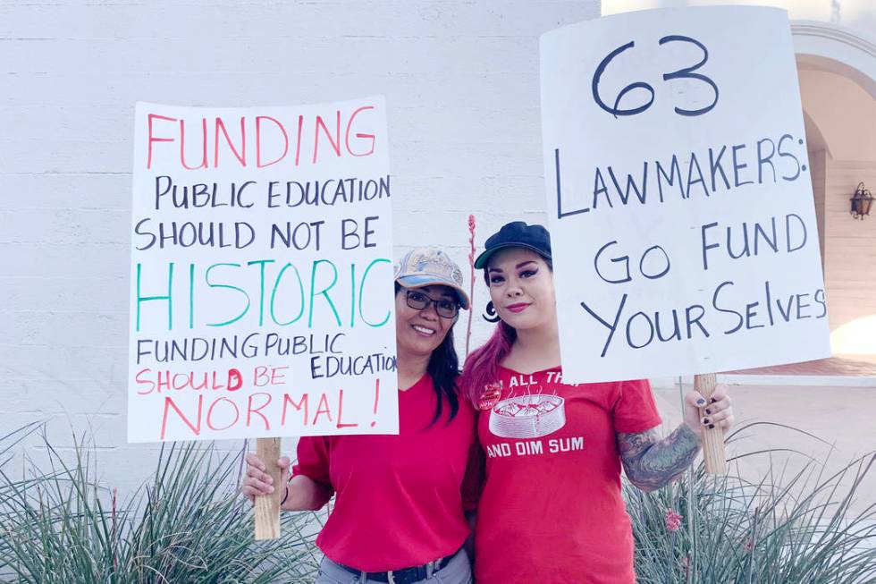 Imelda Suppe, a 56-year-old special education teacher at Helen Herr Elementary School, left, an ...