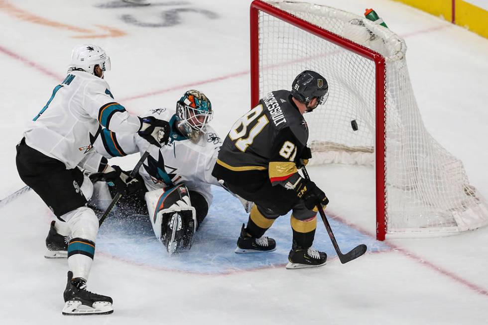 Vegas Golden Knights center Jonathan Marchessault (81) scores against San Jose Sharks goaltende ...