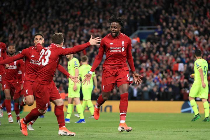 Liverpool's Divock Origi, center, celebrates scoring his side's fourth goal of the game during ...