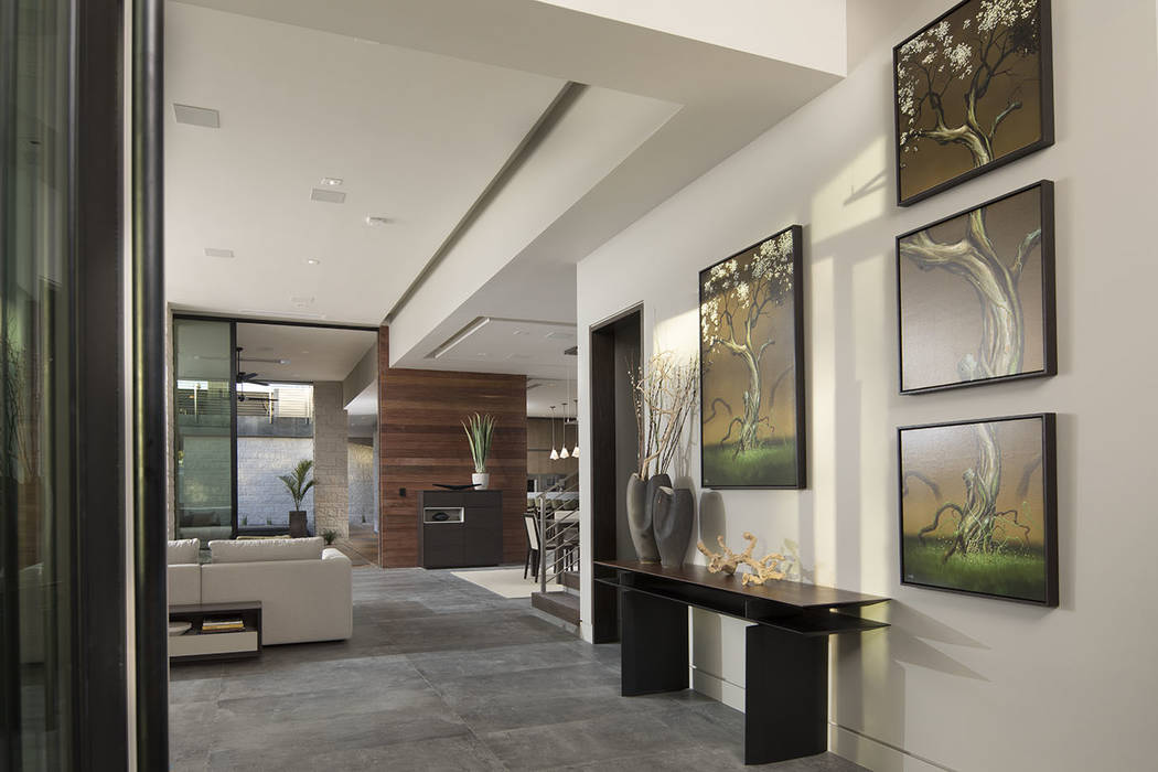 The home's entrance leads into the living room. (Studio G Architecture)