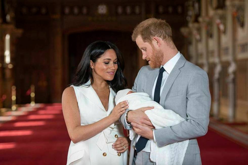 Britain's Prince Harry and Meghan, Duchess of Sussex, during a photocall with their newborn son ...