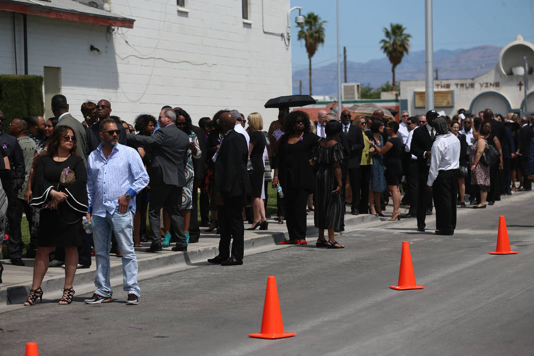 People stand in line to attend the funeral service for Assemblyman Tyrone Thompson, who died Ma ...