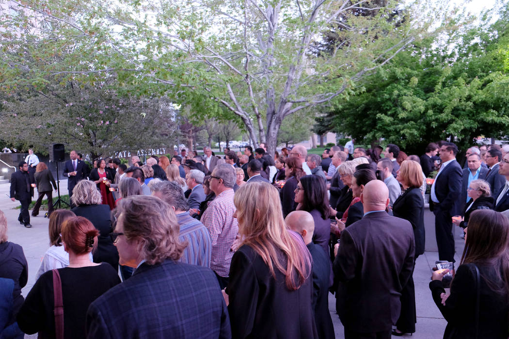 More than 200 people attended a 45-minute candlelight remembrance for North Las Vegas Assemblym ...