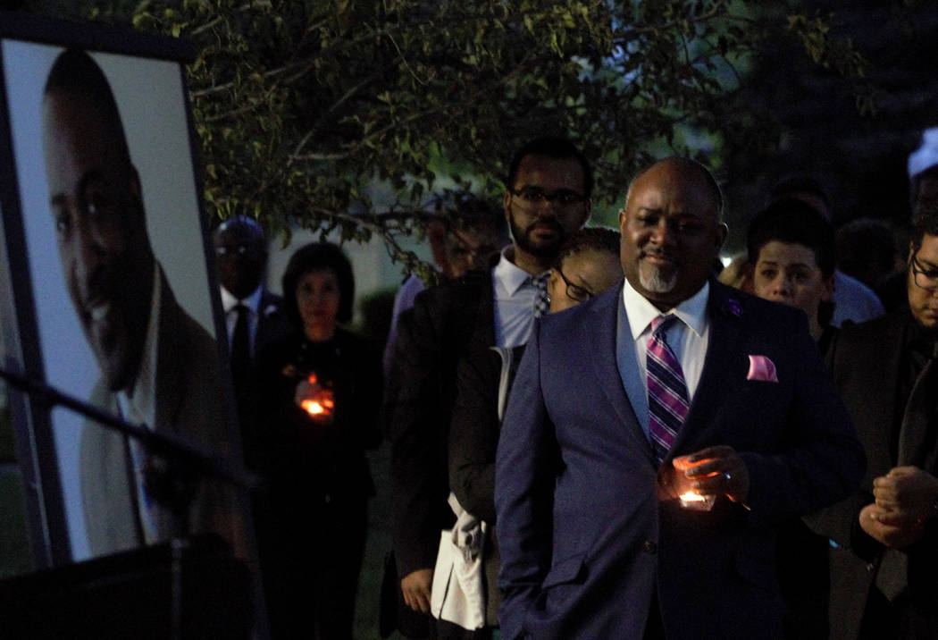 Assembly Speaker Jason Frierson, D-Las Vegas, looks on during a candlelight rememberance for As ...