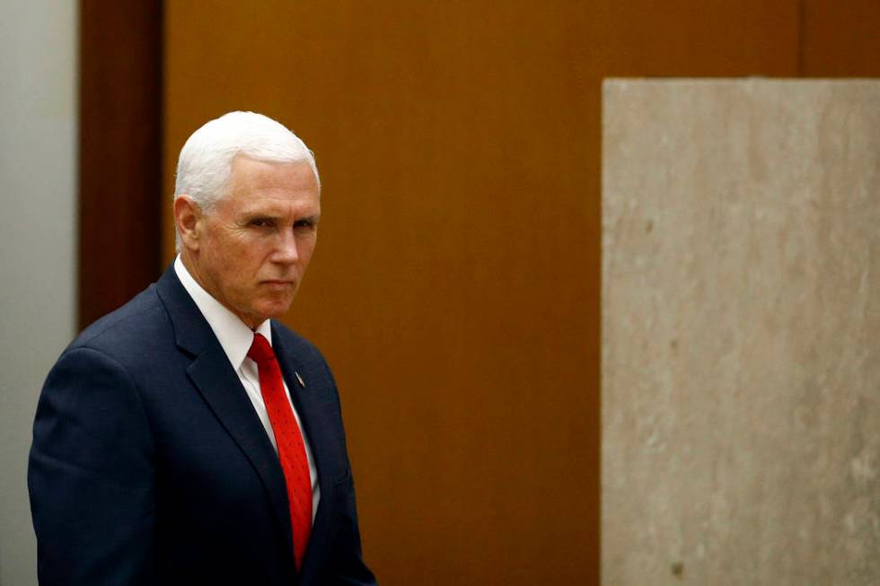 Vice President Mike Pence arrives to speak at the 49th Washington Conference on the Americas, T ...