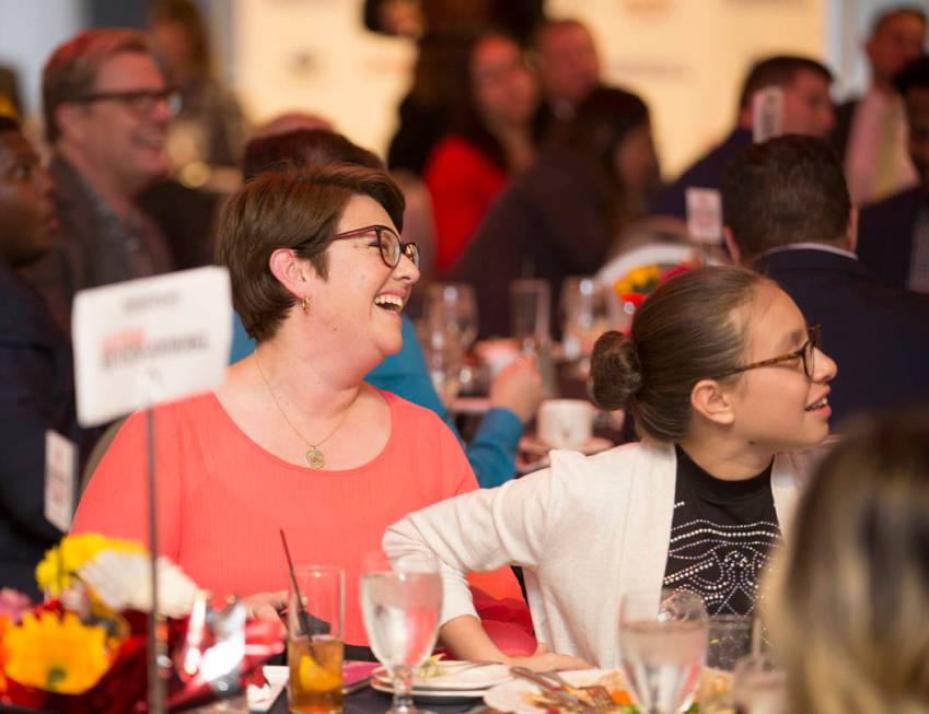 Judge Adriana Arévalo, left, shares a laugh with the crowd during the Las Vegas Review-Journa ...