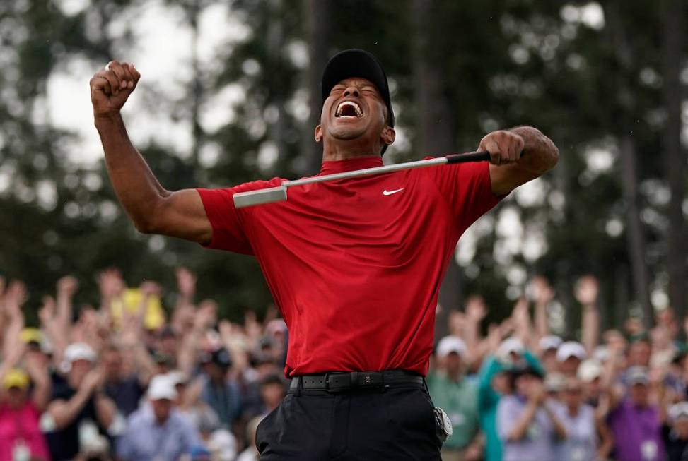 Tiger Woods reacts as he wins the Masters golf tournament Sunday, April 14, 2019, in Augusta, G ...