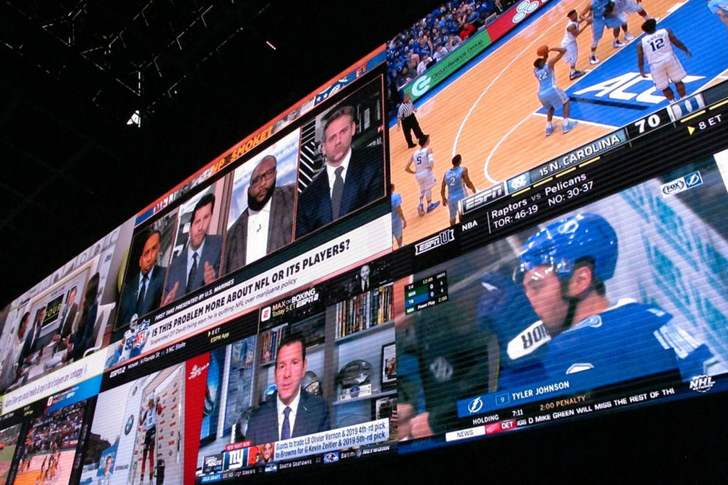 A wall of video screens is seen in the sports betting lounge at the Tropicana casino in Atlanti ...