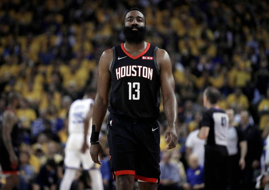 Houston Rockets' James Harden (13) walks downcourt during the first half of Game 5 of the team' ...