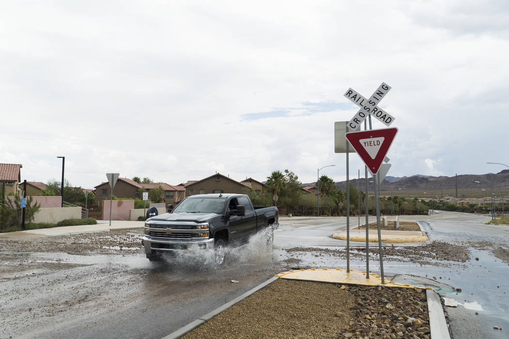 Mud and debris can end up on the roadway during heavy rains. (Las Vegas Review-Journal)
