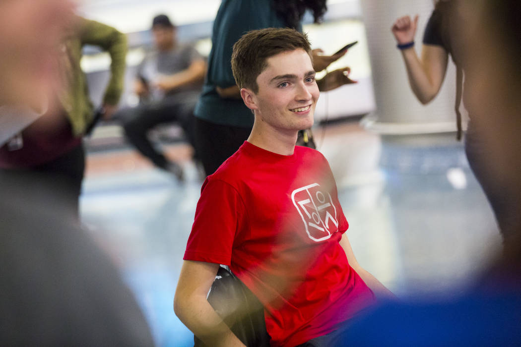 Faith Lutheran senior Mark Wilbourne reacts to a welcome party at McCarran International Airpor ...