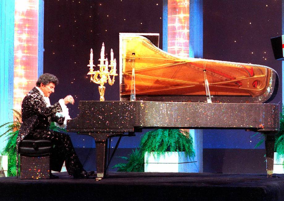 Liiberace plays the piano on the "Tonight Show Starring Johnny Carson" at NBC studios in Burban ...
