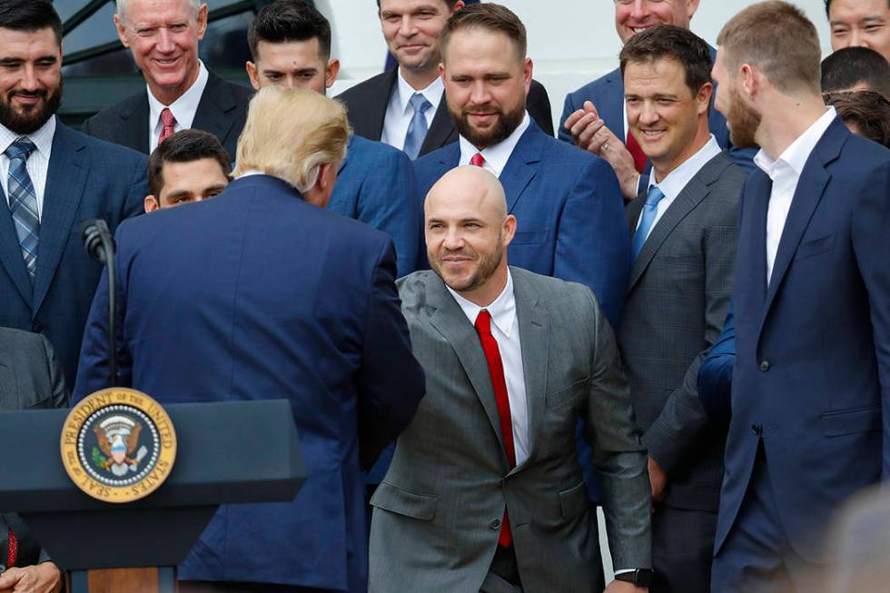 President Donald Trump, left, shakes hands with Steve Pearce, center, during a ceremony on the ...
