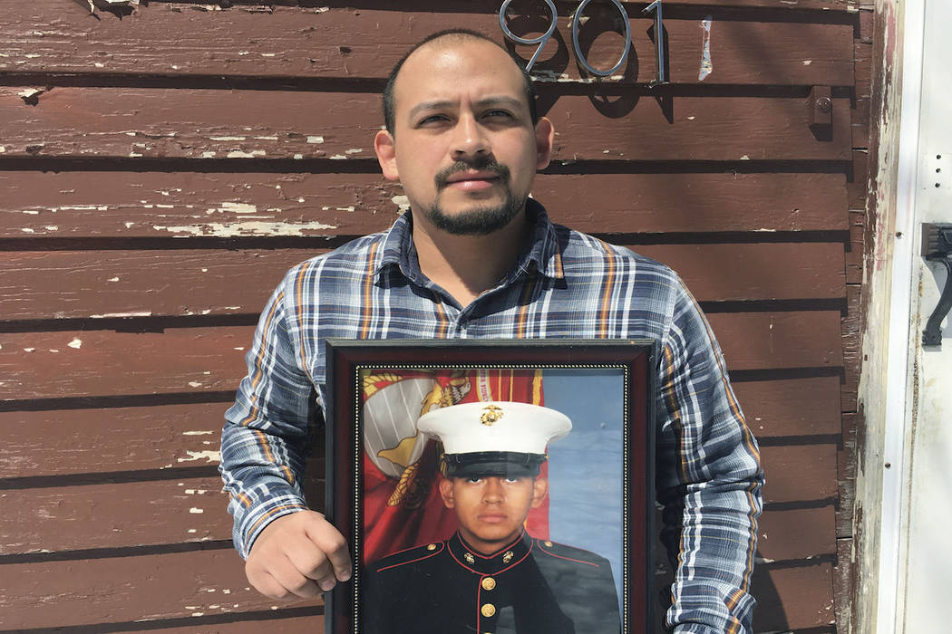 In this April 13, 2019, photo provided by the ACLU of Minnesota, Mark Esqueda poses for a portr ...