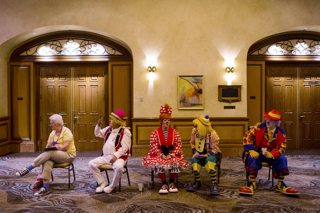 Attendees watch the paradeability competition at the Clowns of America International convention ...