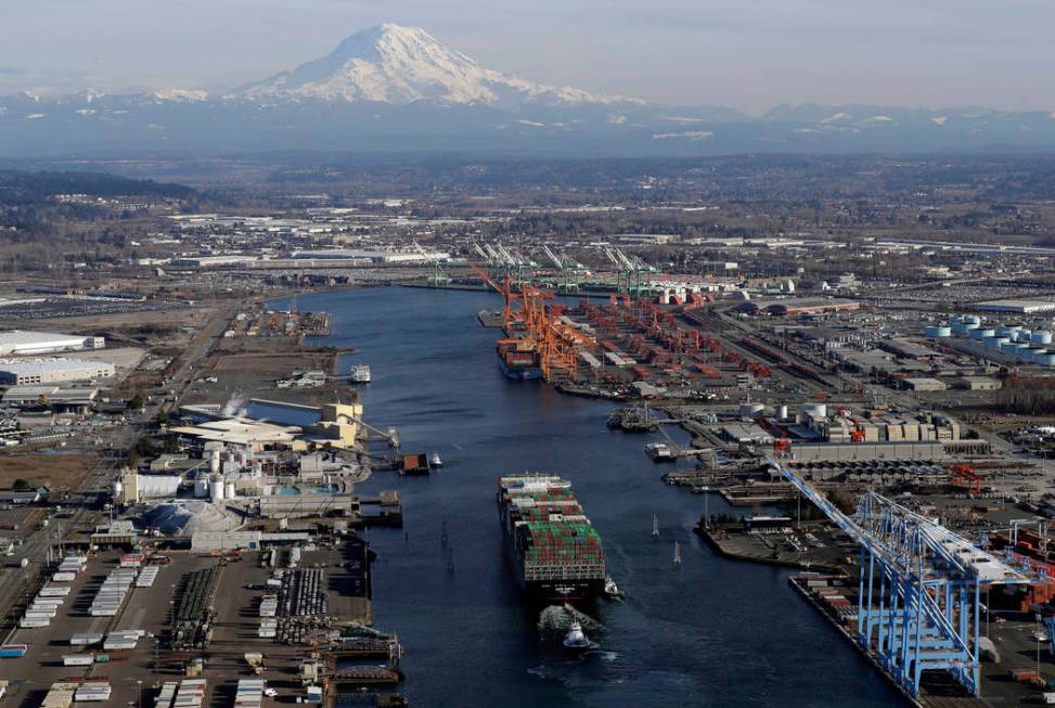 In this March 5, 2019 photo, a cargo ship arrives at the Port of Tacoma, in Tacoma, Wash. U.S. ...