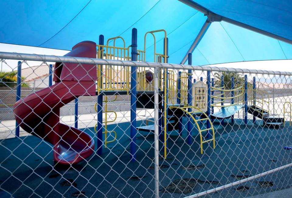 One of two closed playgrounds at Watson Elementary School in North Las Vegas Friday, April 5, 2 ...