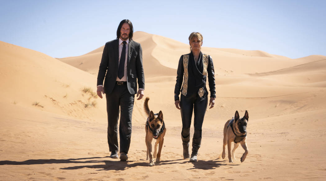 John Wick (Keanu Reeves) and Sofia (Halle Berry) appear in a scene from John Wick: Chapter 3 -- ...