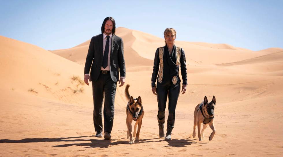 John Wick (Keanu Reeves) and Sofia (Halle Berry) appear in a scene from John Wick: Chapter 3 -- ...