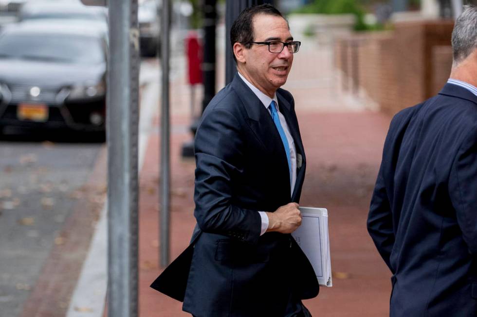 Treasury Secretary Steve Mnuchin arrives at the Office of the United States Trade Representativ ...