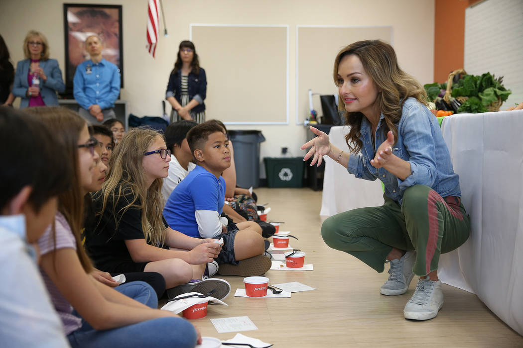 Giada De Laurentiis speaks to students during a Snack in the Garden with Giada event at Blackhu ...