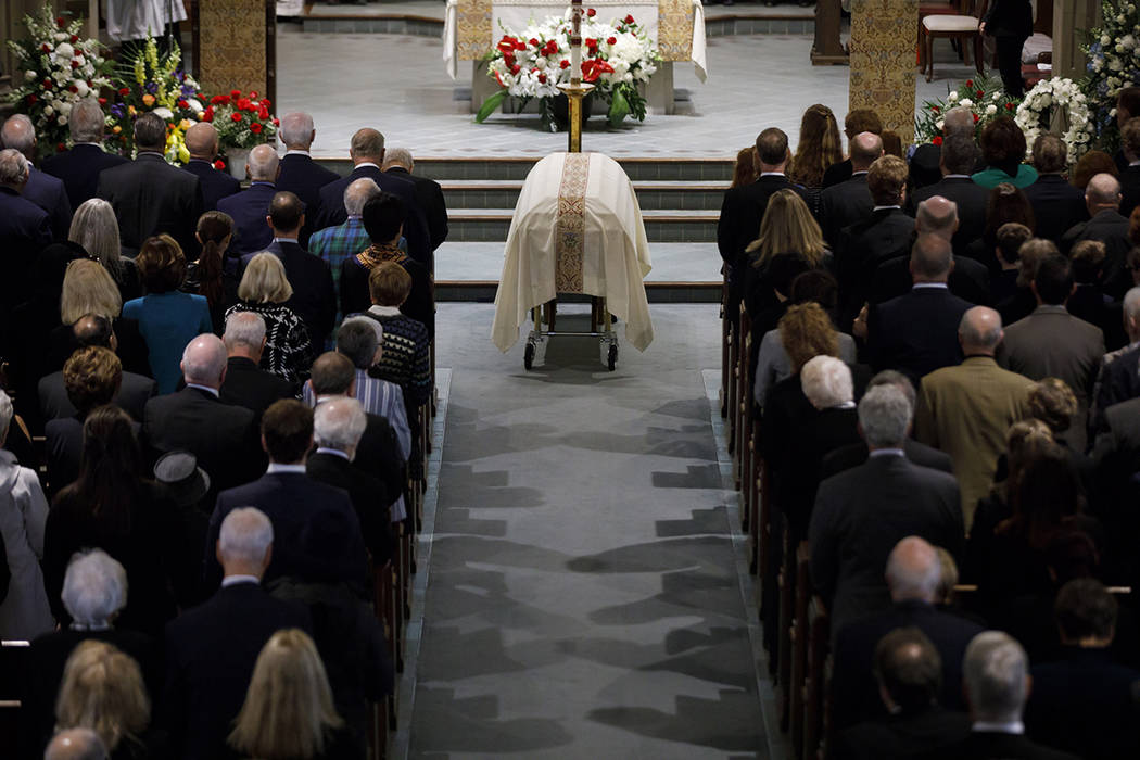 The casket NHL legend Leonard Patrick "Red" Kelly lays at the Holy Rosary Roman Catho ...