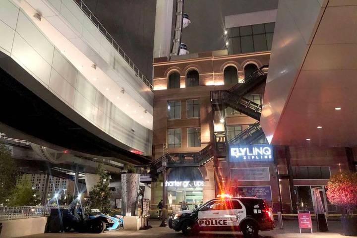 A police car is seen near the High Roller in Las Vegas, Friday, Feb. 15, 2019, after a man fall ...